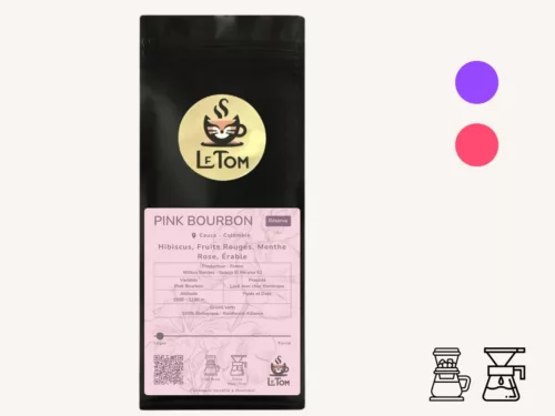 Le Tom Café Pink Bourbon reserve coffee in black packaging with light pink label highlighting Colombian origin from Cauca. Label details flavor notes of hibiscus, red fruits, mint, rose, and maple. Produced by Wilson Benitez at Granja El Paraiso 92 farm using Pink Bourbon variety with thermal shock washing method. Features 1900-2100m altitude, 100% organic and Rainforest Alliance certifications. Light roast, recommended for cold brew, moka pot, and pour-over brewing.